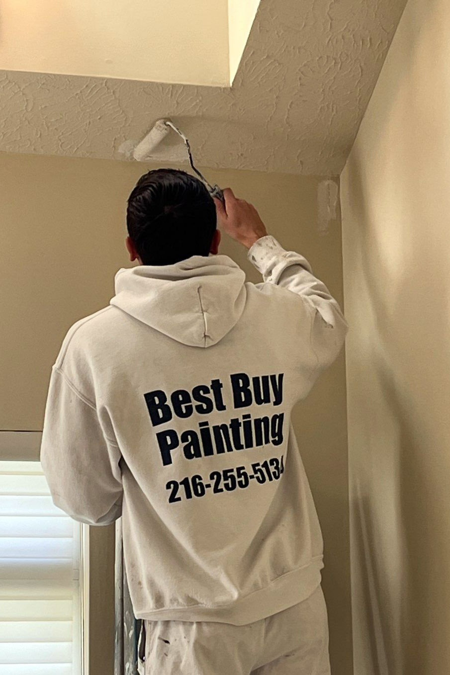 Concrete exterior steps and retaining wall freshly painted gray on a residential home.